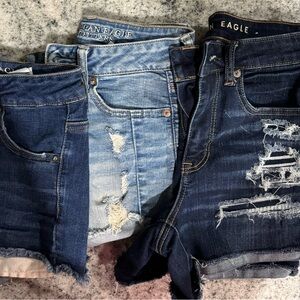 distressed AE denim shorts, one pair is longer than the other two. 3/$12.